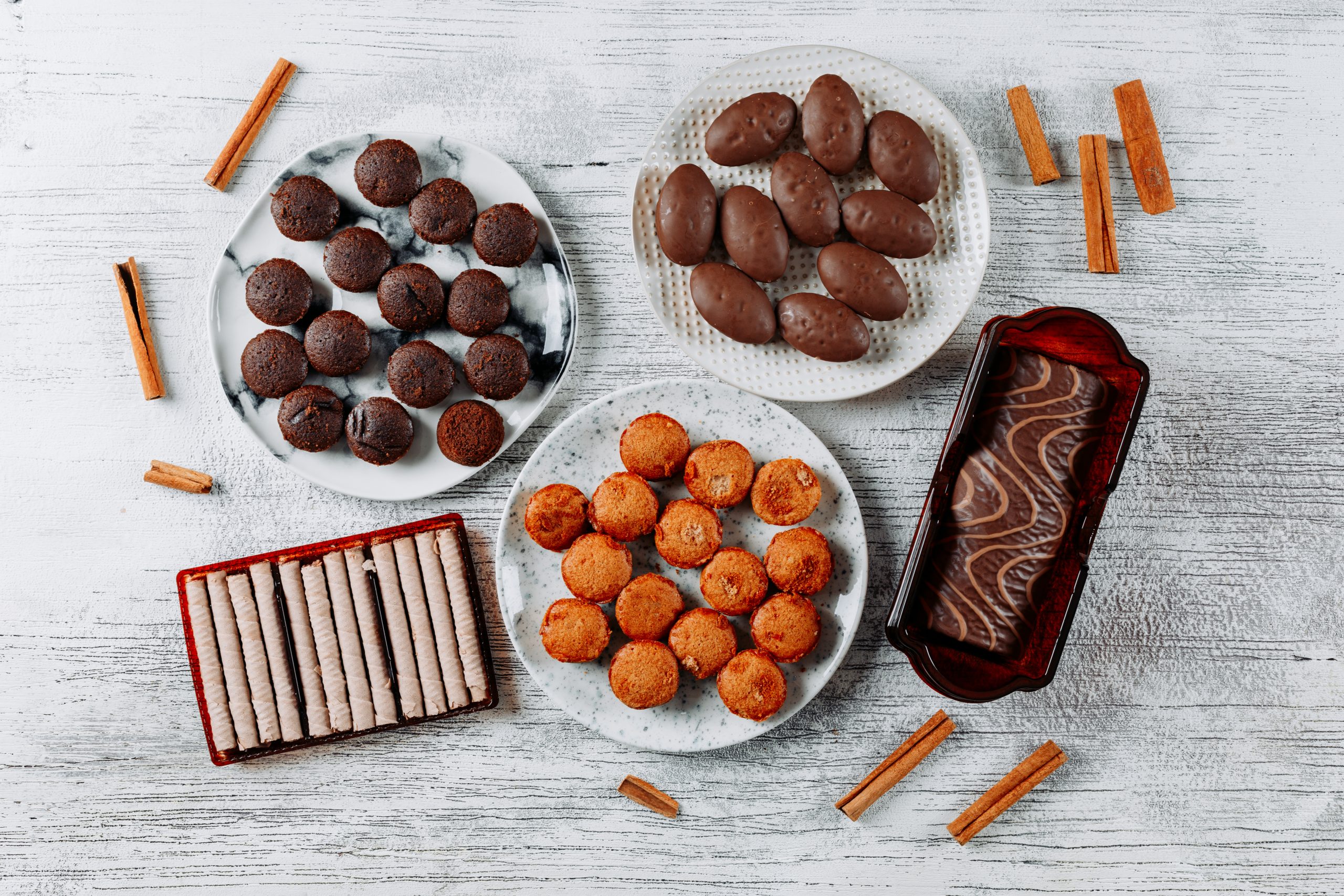 top view types cookies plates white wooden scaled